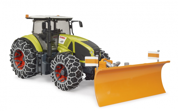 Claas Axion 950 mit Schneekette und Räumschild